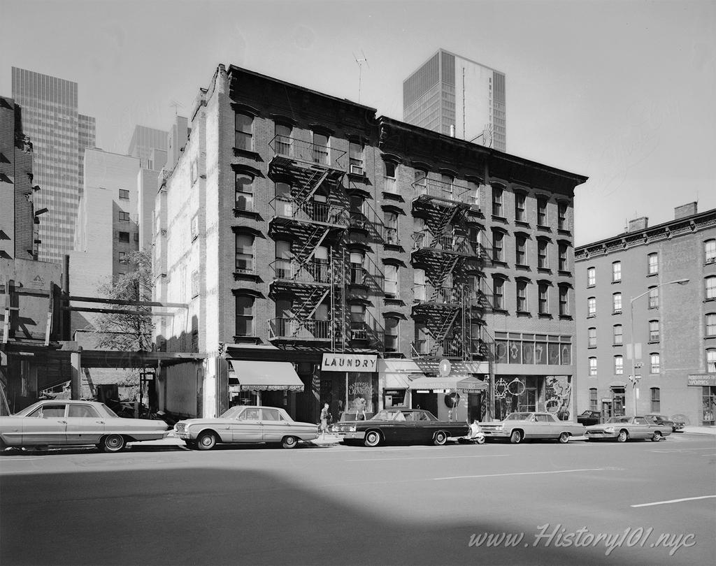 Photograph of cars and buildings on Second Avenue and East 41st Street.