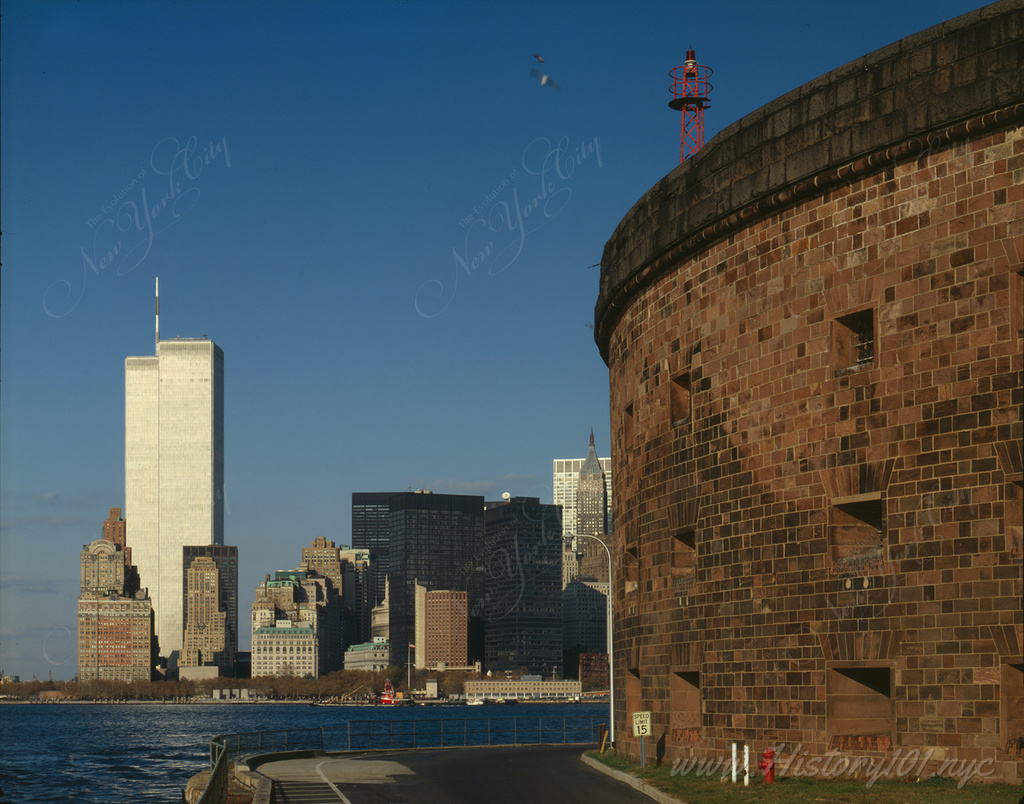 Photograph of Governor's Island with the World Trade Center visible in the background.